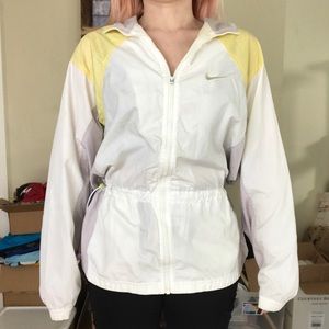 Yellow, white and grey Nike windbreaker